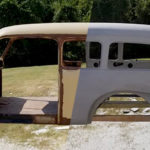 The body of a vintage automobile after automotive sandblasting was applied