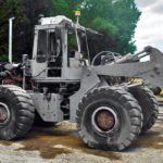 A bulldozer after industrial sandblasting application