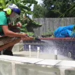 Residential sandblasting done by Central Alabama Mobile Sandblasting on a fountain of a pool to remove calcium buildup