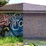 Graffiti removal on a brick building before and after using mobile sandblasting paint stripping